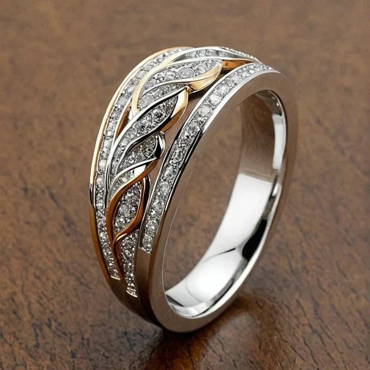 Hollow, shiny, braided gold and silver ring