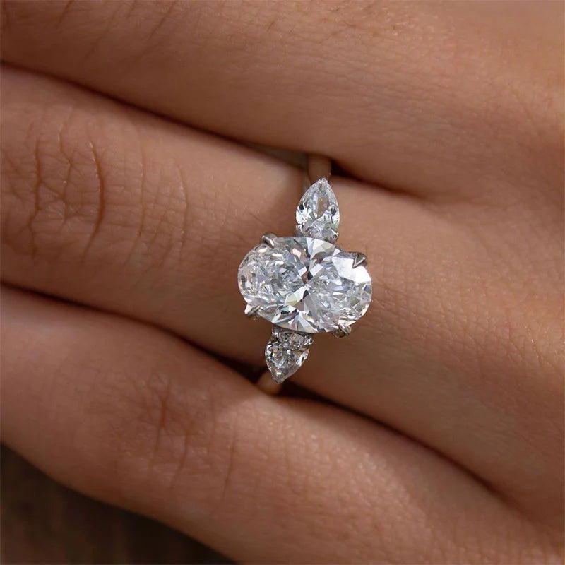 Oval Cut Three Stone Engagement Ring