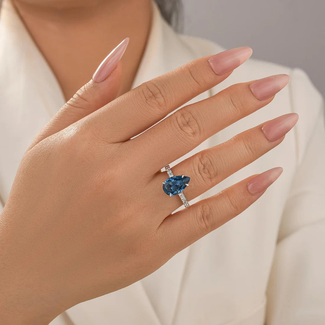 Pear Cut Blue Sapphire Engagement Ring