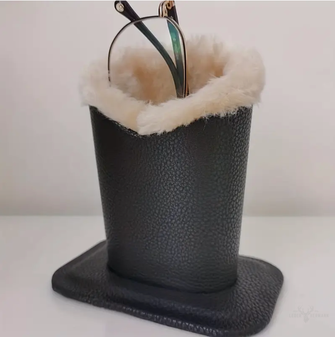 Zarino's glasses stand for the desk