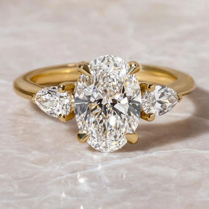 Oval Cut Three Stone Engagement Ring