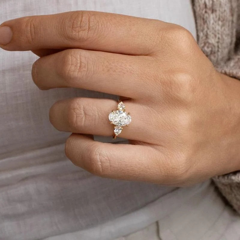 Oval Cut Three Stone Engagement Ring