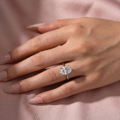Oval Cut Hidden Halo Engagement Ring
