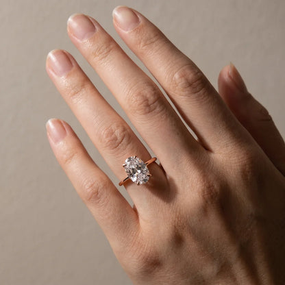 Oval Cut Hidden Halo Engagement Ring