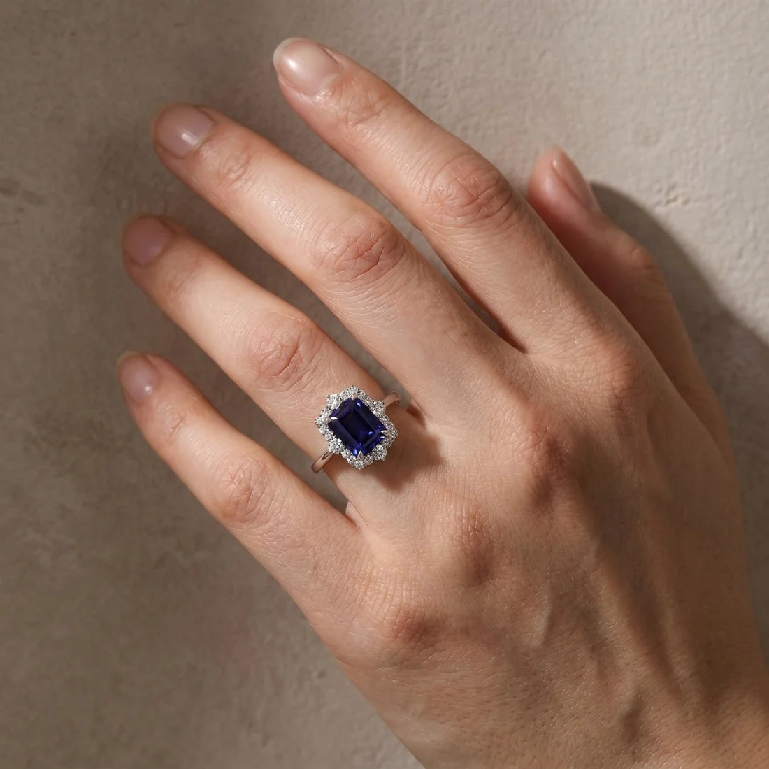 Halo Emerald Cut Blue Sapphire Ring