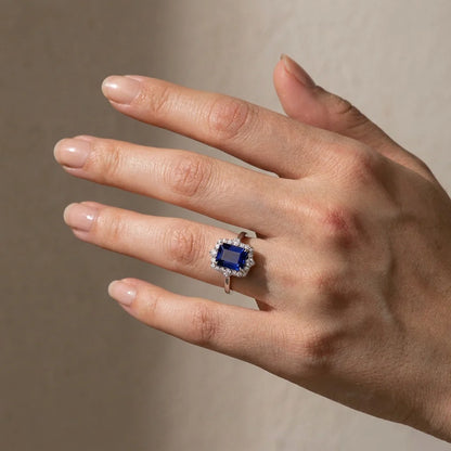 Halo Emerald Cut Blue Sapphire Ring