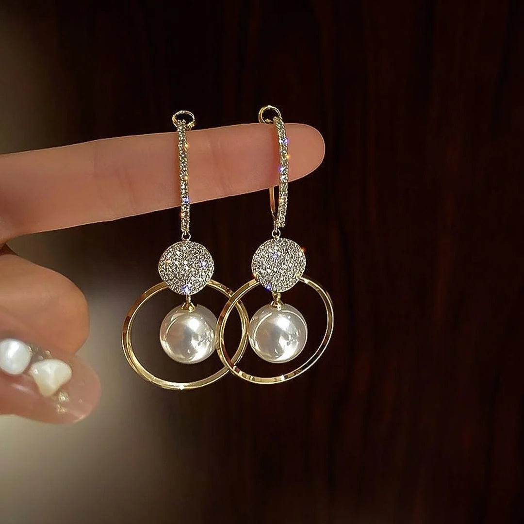 Earrings with Cultured Pearls and Embezzled Balls