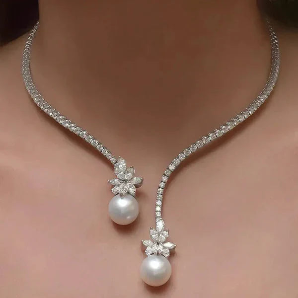 1+1 Offer: Elegant shiny necklace with pearls made of silver + Emerald Cut White Sapphire Bracelet