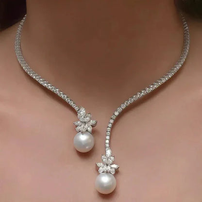 1+1 Offer: Elegant shiny necklace with pearls made of silver + Emerald Cut White Sapphire Bracelet