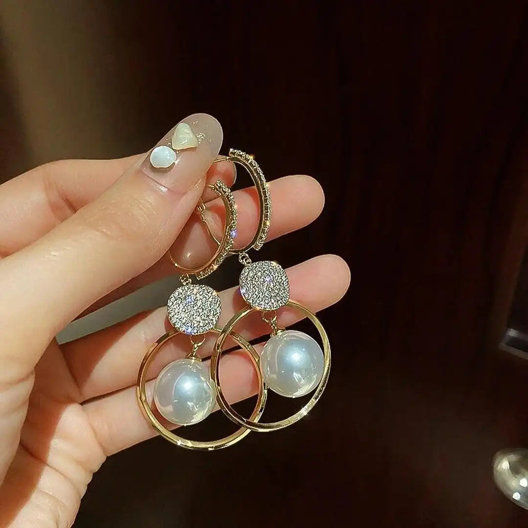 Earrings with Cultured Pearls and Embezzled Balls
